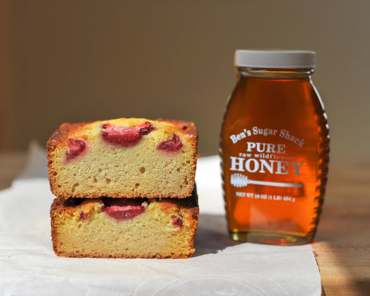 Milk and Honey loaf cake with vanilla-honey sweetened strawberries and fresh cream