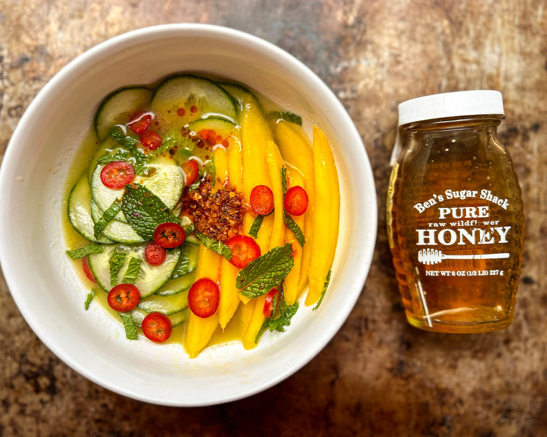 Thai inspired honey - fish vinaigrette with fresh mango, cucumber, red chilies and mint.